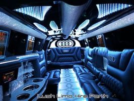 LED lighting of the Audi Limo inside showing the gorgeous interior, Audi rings, glassware and passenger seating